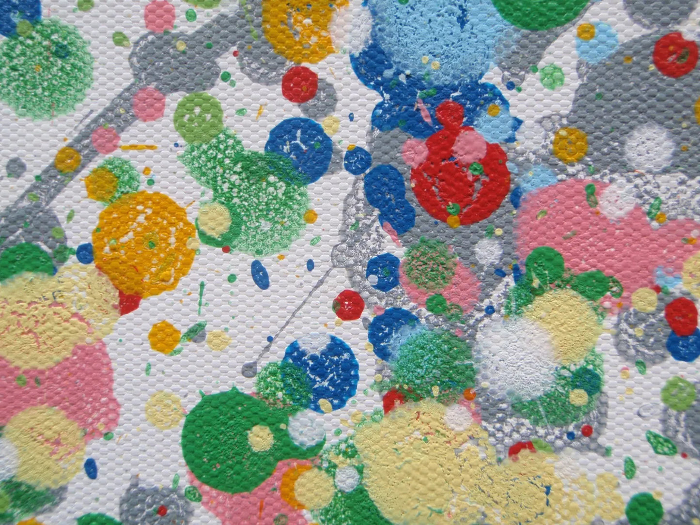 Colorful abstract pattern with circular shapes on a textured background