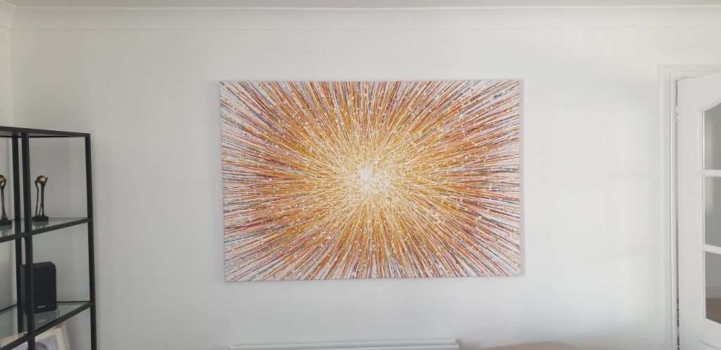 Customer showcase photo of my very large yellow star canvas painting on display in his home