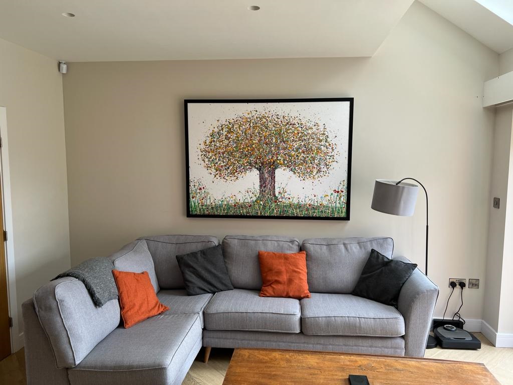 Customer showcase photo showing my original very large tree painting on display in his home