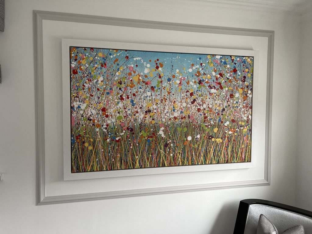 Customer showcase photo showing my large original flower painting on display in his home - close up view