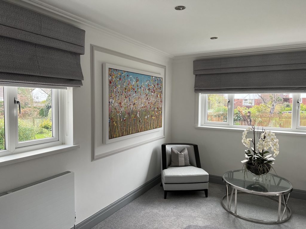 Customer showcase photo showing my large original flower painting on display in his home - distant view