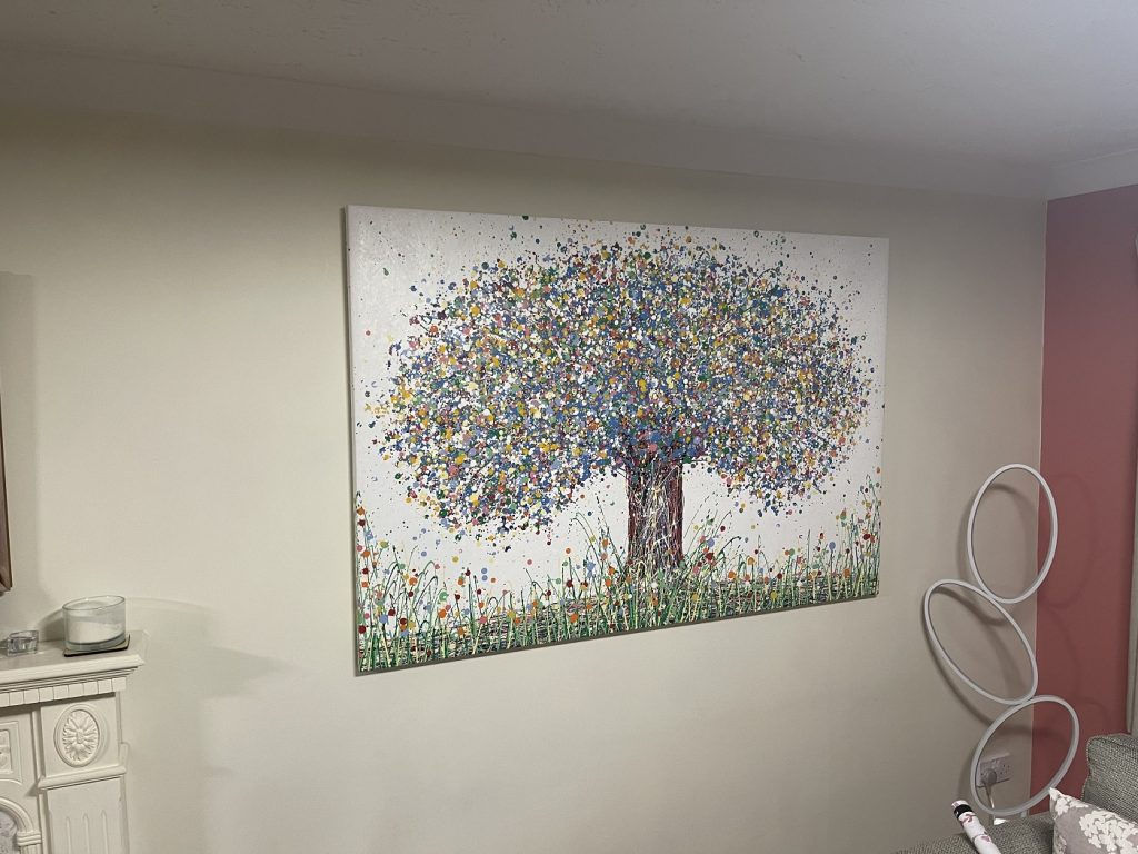 Oversize modern art blue and yellow abstract tree painting on canvas on display in my customer's home