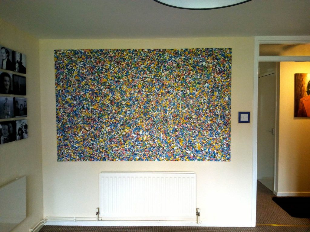 Customer showcase photo of this custom size dot and spot painting now on display in his home 1