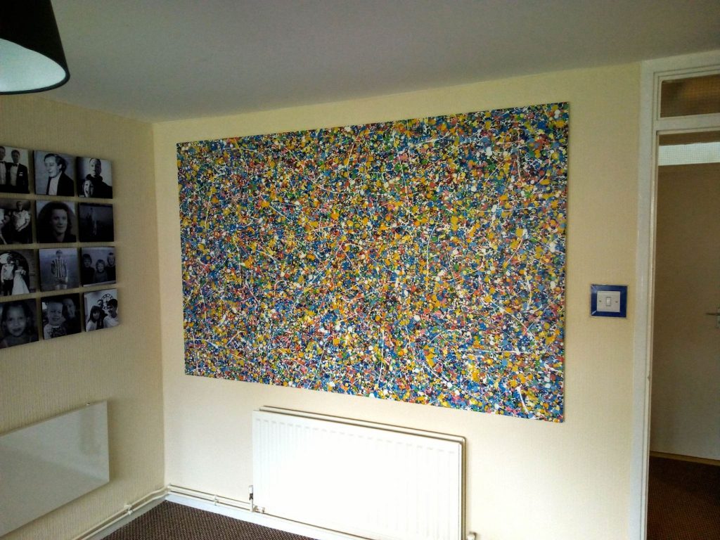 Customer showcase photo of this custom size dot and spot painting now on display in his home 2