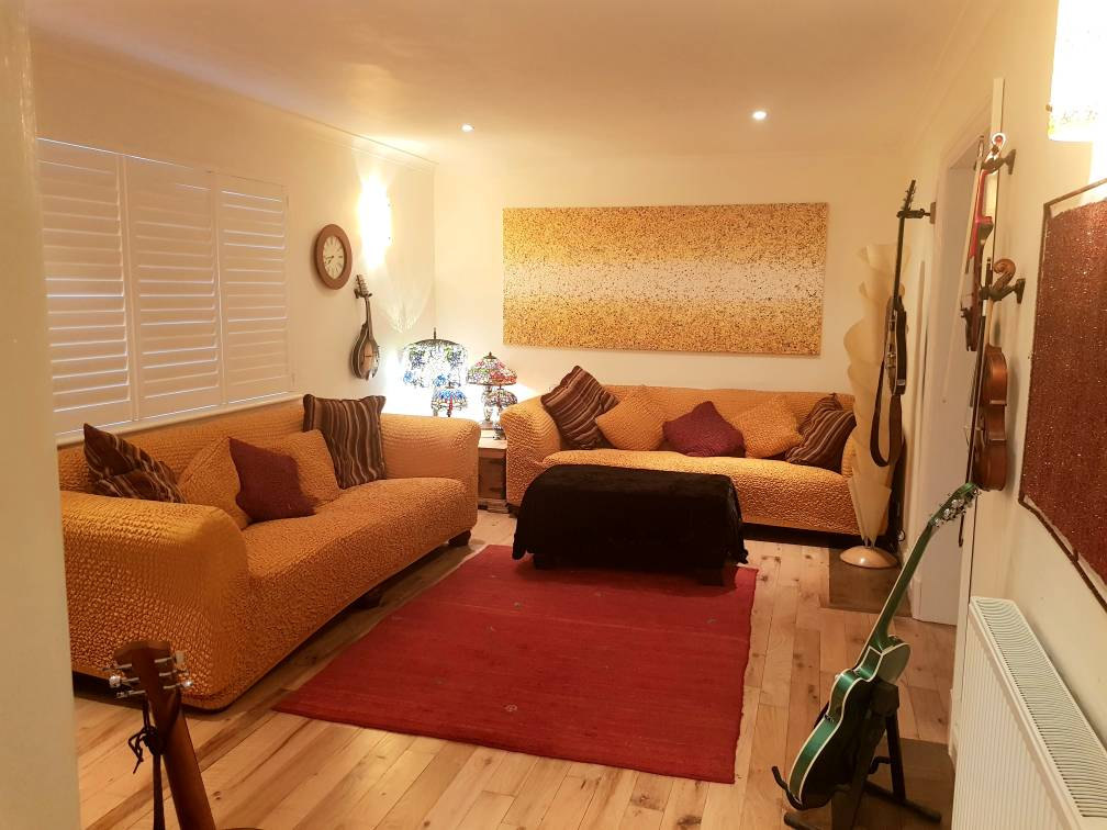 Extremely wide panoramic yellow dot and spot landscape painting on canvas on display in my customer's home