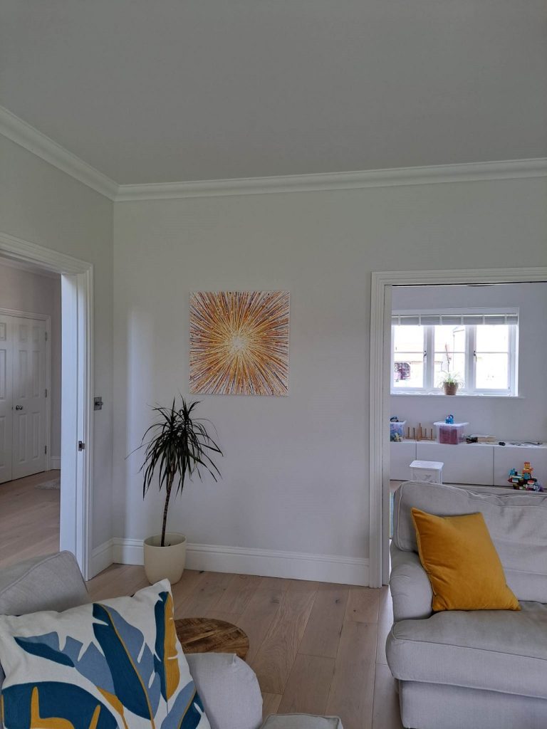 Customer showcase photo of my yellow and orange colourful starburst original canvas painting