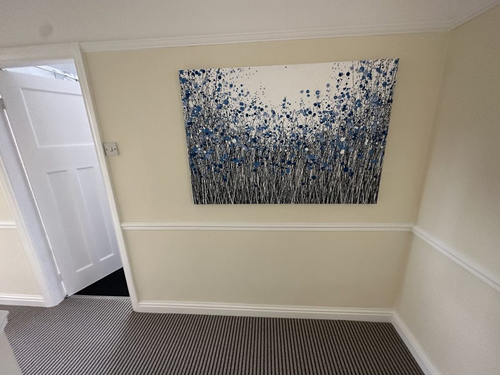 Customer showcase photo of my hand painted very big modern art flower painting on display in her home