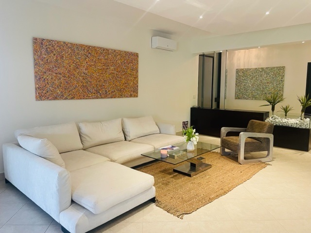 My enormous hand painted abstract expressionist canvases on display in my customer's home