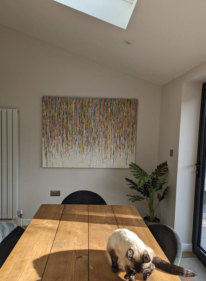 Rich Gane Art 160 cm by 112 cm modern art vertical drip painting in a very colourful style - on display in my customer's home
