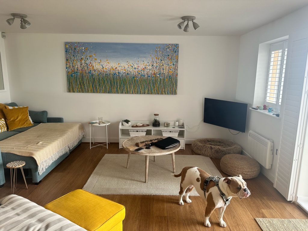 Customer photo of my really big 235cm by 103cm flower meadow painting on display in her home 1