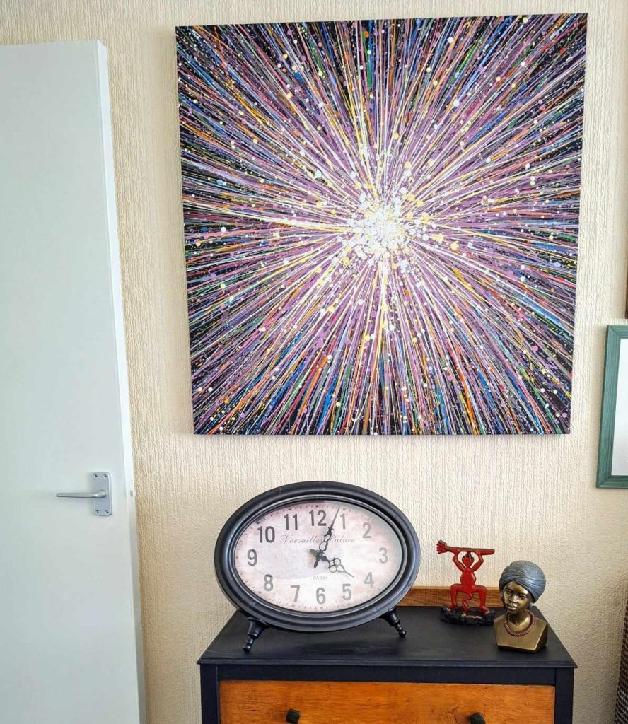 Customer showcase photo of my really big original colourful star painting that is now on display in his home