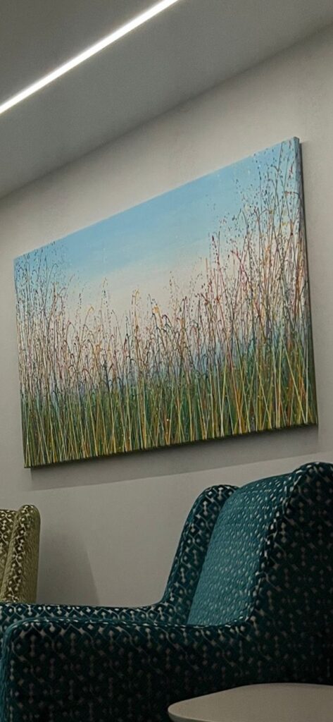 Customer showcase photo of my really big abstract meadow painting on a canvas, with custom colours