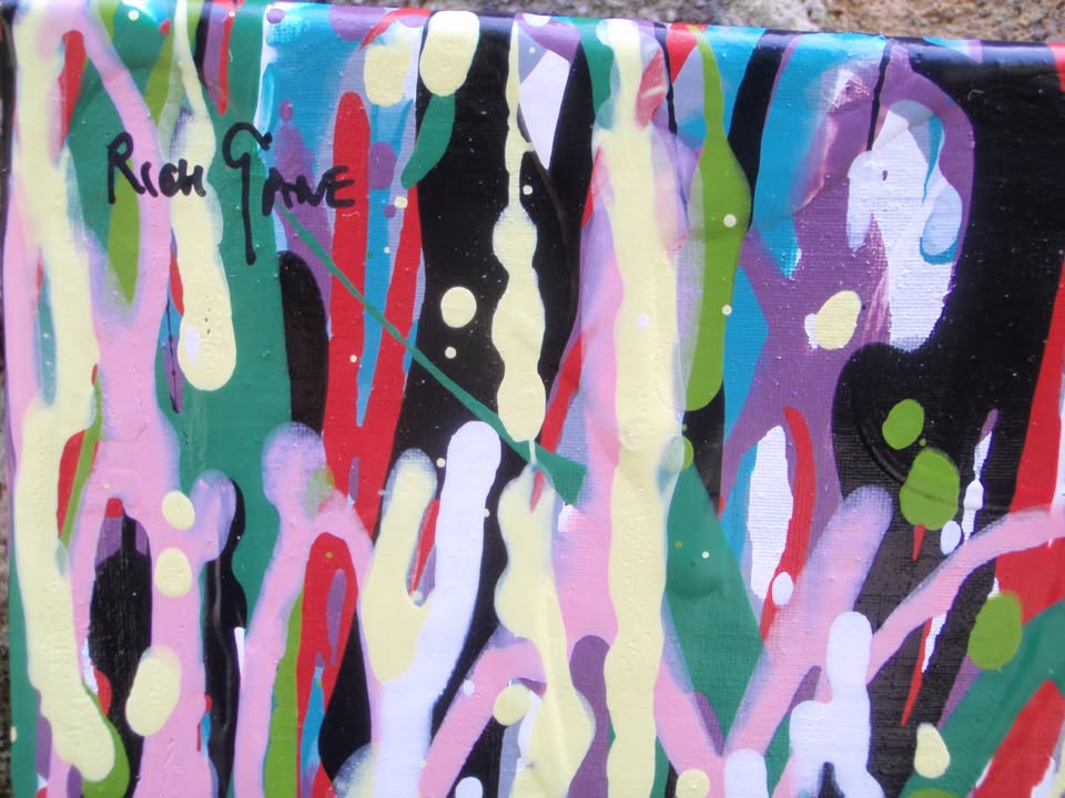 Abstract art with multicoloured vertical brush strokes on a white background - detail