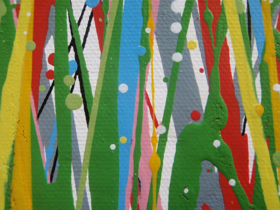 Abstract floral field painting with green grass-like strokes and many red, yellow, blue, and pink flower-like splatters on a white background - detail