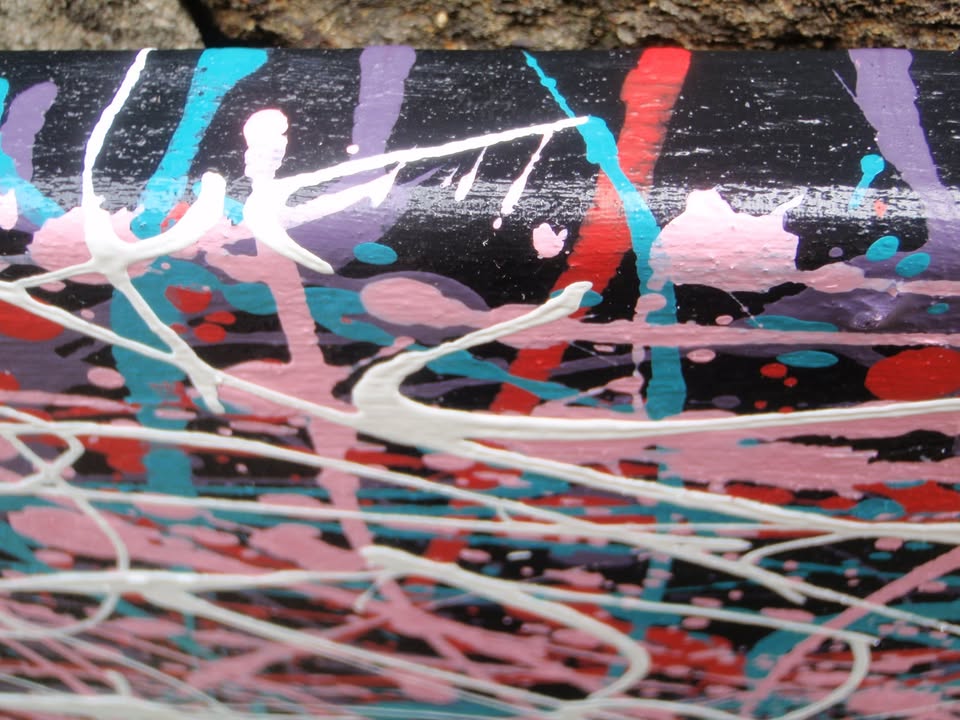 Abstract art with pink, white, and blue lines on a textured black background, hand-painted on to a 100 by 80 cm stretched canvas - detail