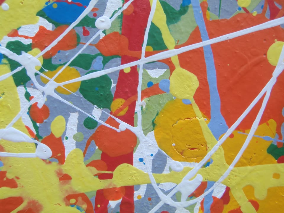 Abstract art with colourful drips and splashes of red, yellow, and blue, on a large framed canvas - detail