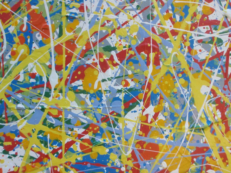 Abstract art with colourful drips and splashes of red, yellow, and blue, on a large framed canvas - detail