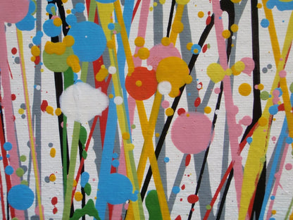 A colourful abstract painting of a grassy field under a blue sky, with splashes of pink, yellow, blue, green, and orange dots and lines throughout, hand-painted on to a large canvas - detail