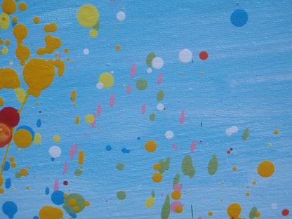 A colourful abstract landscape painting depicting a field of tall grass under a blue sky, with splatters and drips of yellow, red, orange, blue, pink, and green paint throughout. Hand-painted on to a large 101.5 by 81 cm stretched canvas - detail