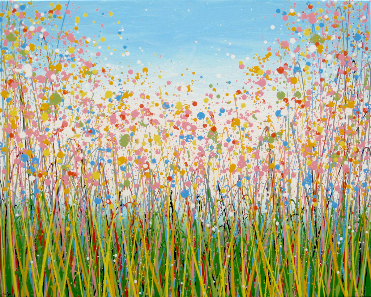 A colourful abstract painting of a grassy field under a blue sky, with splashes of pink, yellow, blue, green, and orange dots and lines throughout, hand-painted on to a large canvas - full view