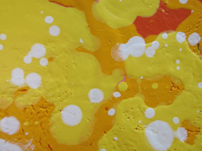 Really big hand painted colourful abstract painting on a very large framed canvas, featuring a vibrant starburst on a black background - detail