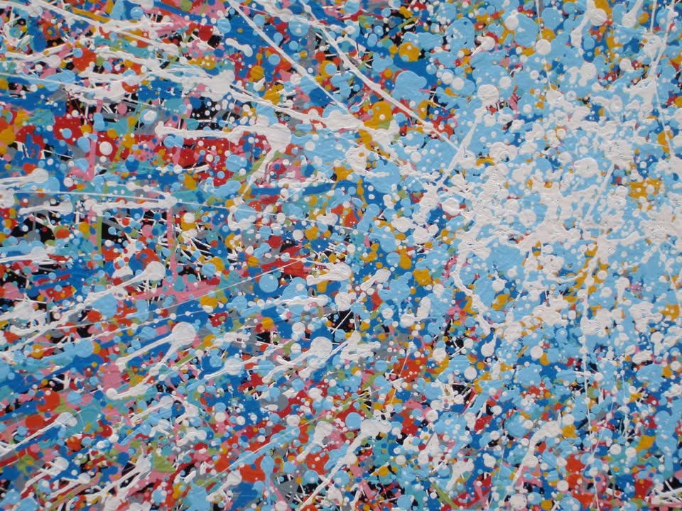 Unique abstract radial artwork filled with dense splatters and streaks of blue, red, orange, yellow, black, and white radiating from a bright white centre, on a 150 by 100 cm framed canvas - detail