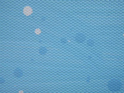 Colourful abstract painting of blue flowers and grass with a blue sky, on a 159 cm by 112 cm canvas - detail