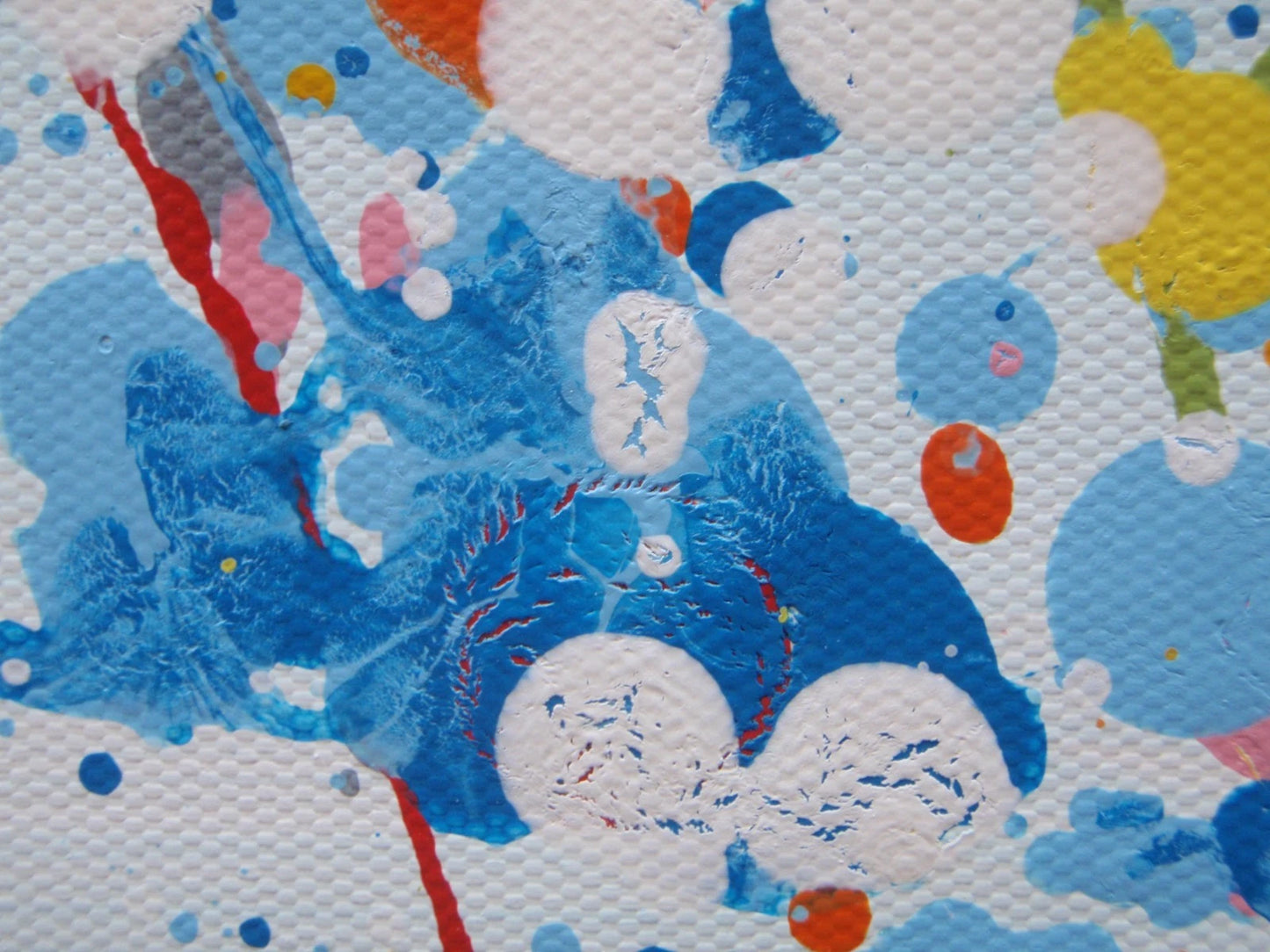 Colourful abstract painting of blue flowers and grass with a blue sky, on a 159 cm by 112 cm canvas - detail