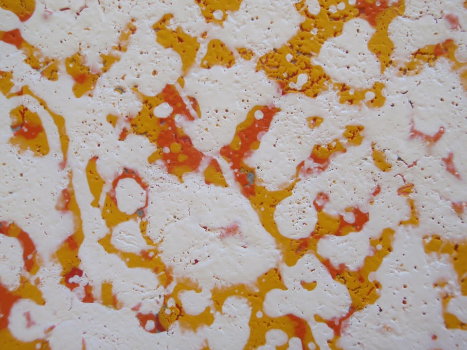 Modern art painting showing a burst of colourful rays of light from a central star against a dark blue sky - detail