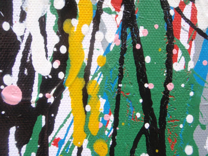 Abstract artwork of a face with colourful drips and splashes on a white background, painted on to an un-stretched 159 by 112 cm canvas - detail