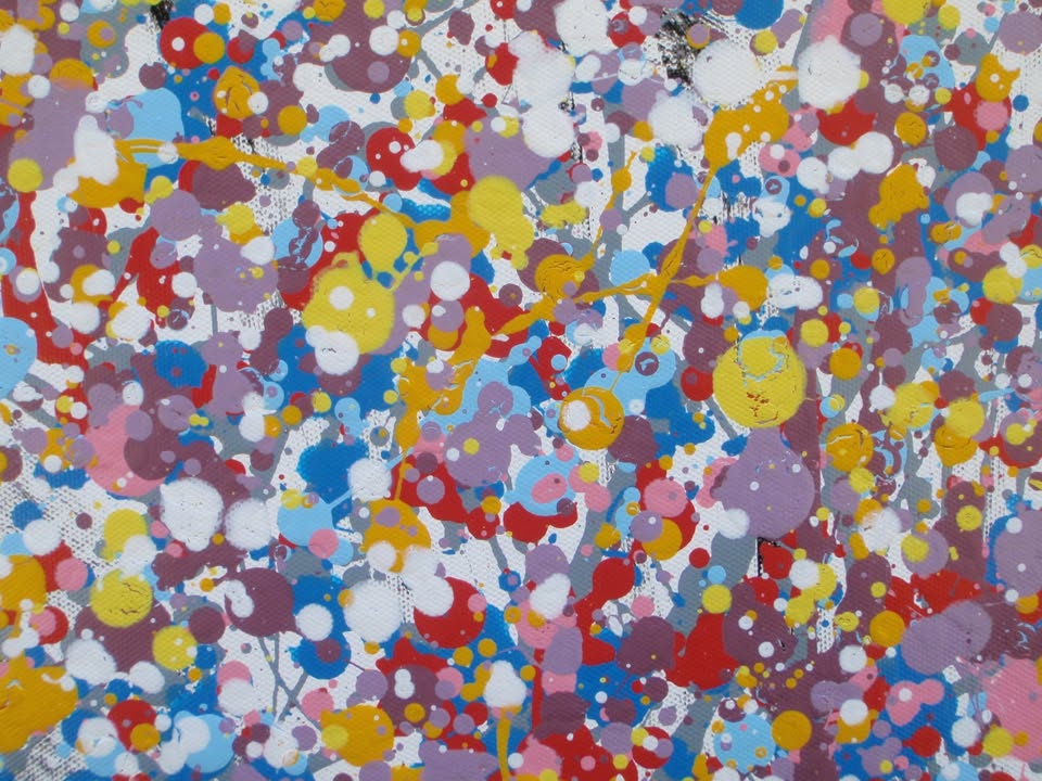 A colourful abstract painting of a tree with a dense canopy made of multicoloured paint splatters, including lilac and purple, and a textured trunk, set against a plain white background. Hand painted on to a 159 by 112 cm canvas. Close up photo.