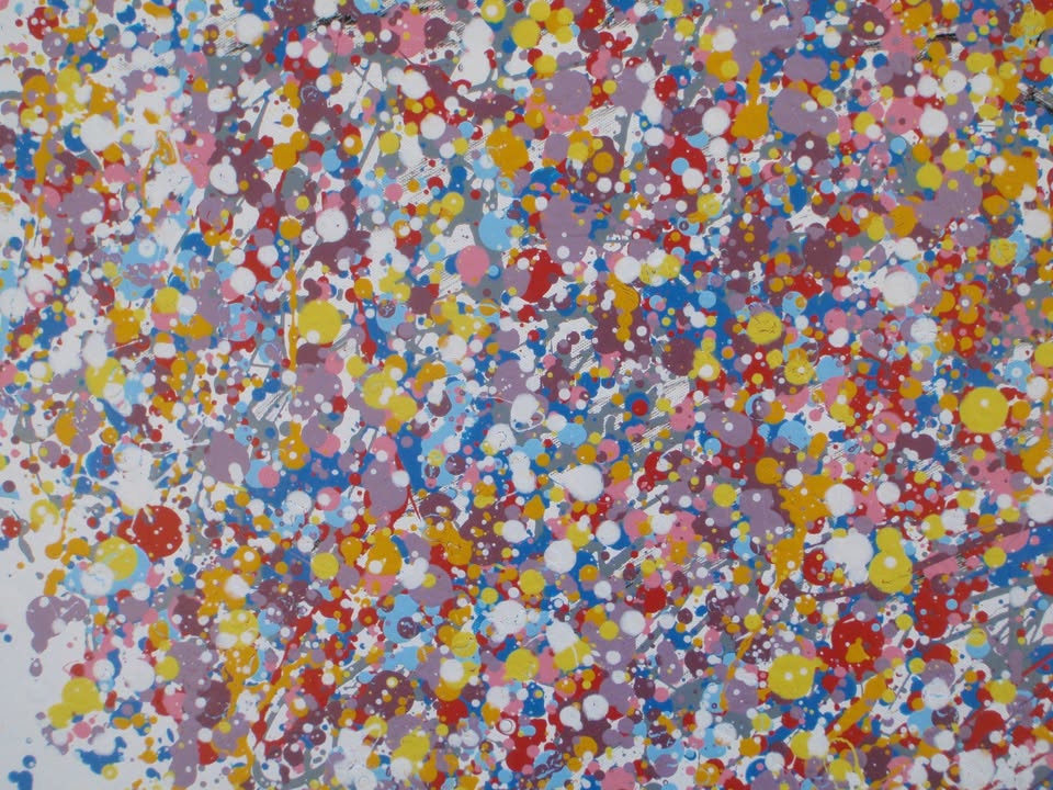 A colourful abstract painting of a tree with a dense canopy made of multicoloured paint splatters, including lilac and purple, and a textured trunk, set against a plain white background. Hand painted on to a 159 by 112 cm canvas. Close up photo.