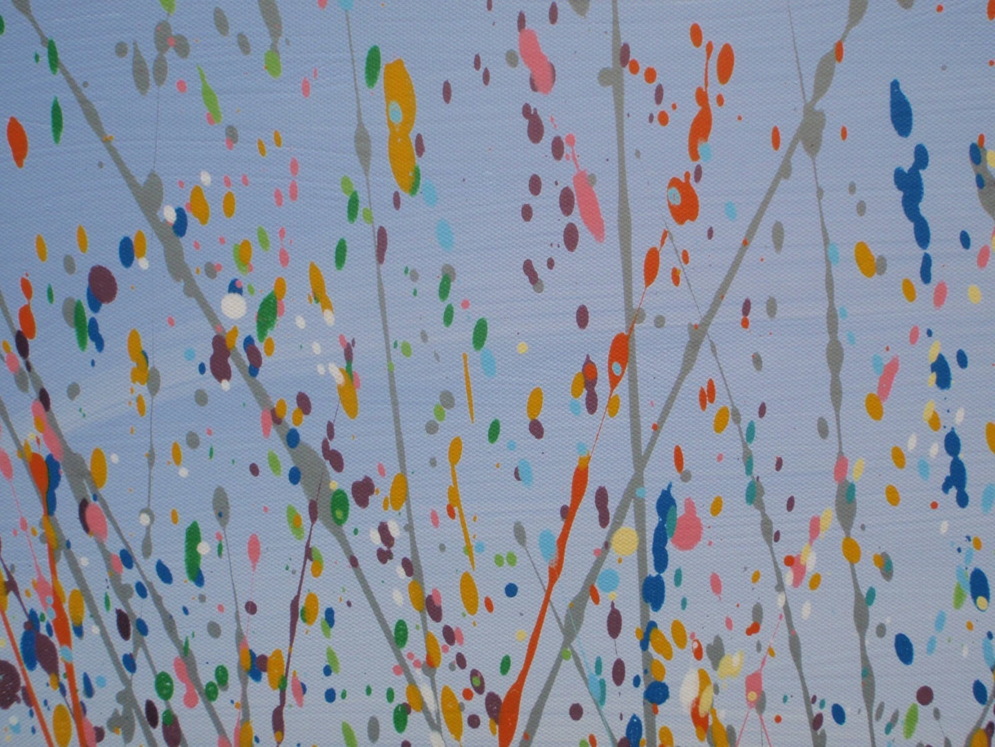 Painting close-up: Colourful abstract pattern on a light blue background
