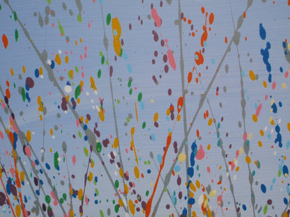Painting close-up: Colourful abstract pattern on a light blue background