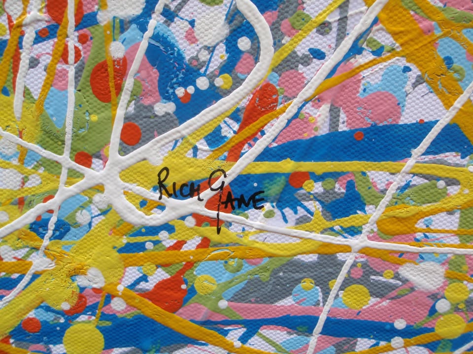 An abstract rectangular canvas painting filled with dense, energetic lines and dots in a multicolour palette of yellow, blue, orange, and white on a light background. Hand-painted on to a 250 by 112 cm canvas. Detail.
