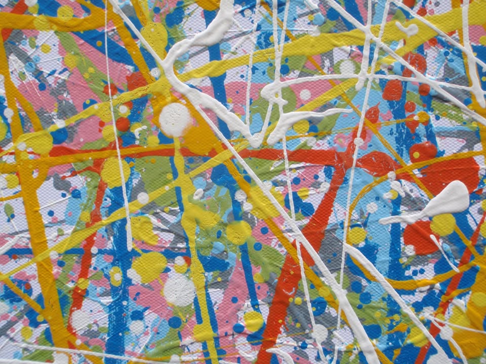 An abstract rectangular canvas painting filled with dense, energetic lines and dots in a multicolour palette of yellow, blue, orange, and white on a light background. Hand-painted on to a 250 by 112 cm canvas. Detail.