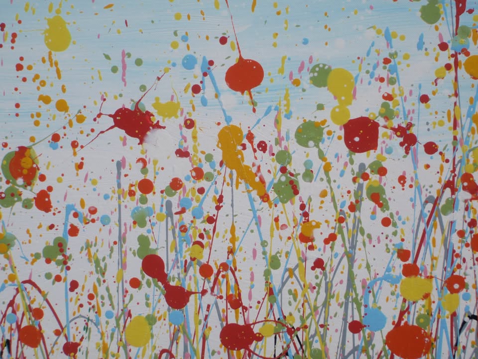 Giant hand-made painting of a field of colourful flowers, especially red ones, with a blue sky, on a 250 by 112cm canvas - detail