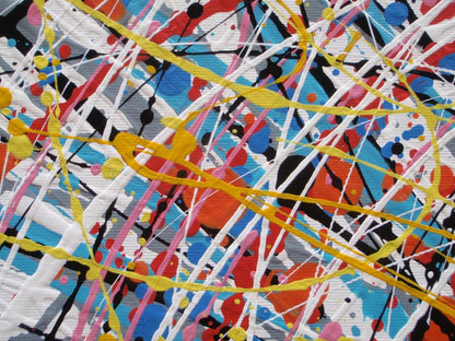 Abstract expressionist painting featuring a dense, circular composition of energetic splatters, drips, and intersecting lines in yellow, white, red, blue, black, and orange. Hand-painted by me, Rich Gane, on to a large, framed, 80 by 60 cm canvas - detail
