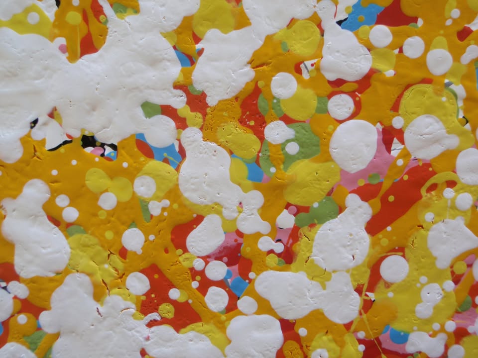 Abstract radial burst painting with dense splatters and streaks of yellow, orange, white, blue, pink, red, and green radiating outward from a bright central area, on 80 by 60 cm canvas - detail