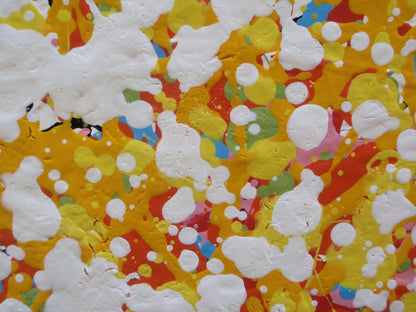 Abstract radial burst painting with dense splatters and streaks of yellow, orange, white, blue, pink, red, and green radiating outward from a bright central area, on 80 by 60 cm canvas - detail