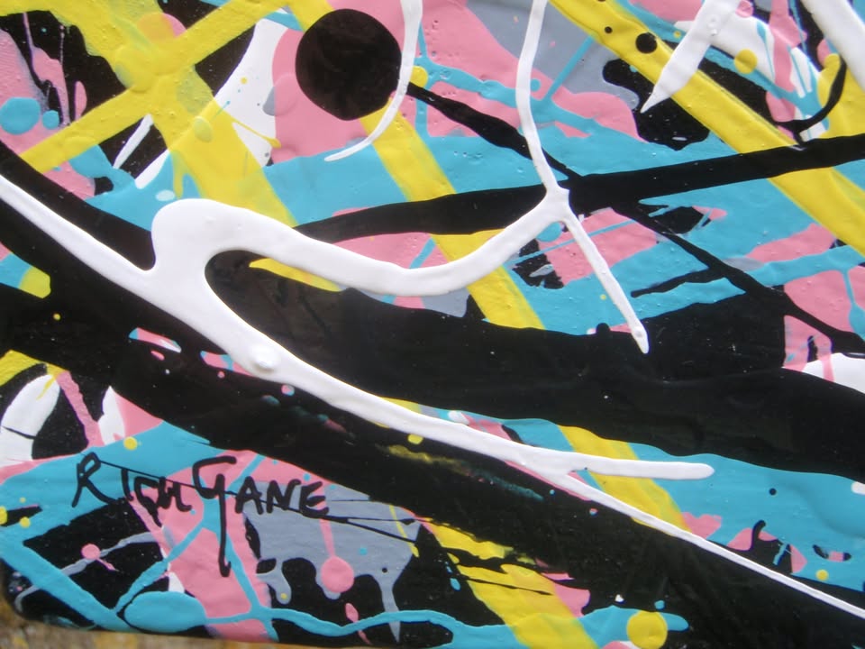 Abstract canvas art 150 by 100 cm painting featuring a dense, expressive composition of overlapping black, yellow, blue, pink, and white paint splatters and scribbles on a dark background - detail