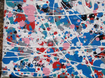 Colourful mosaic artwork with 'LOVE' spelled out on a textured background - detail