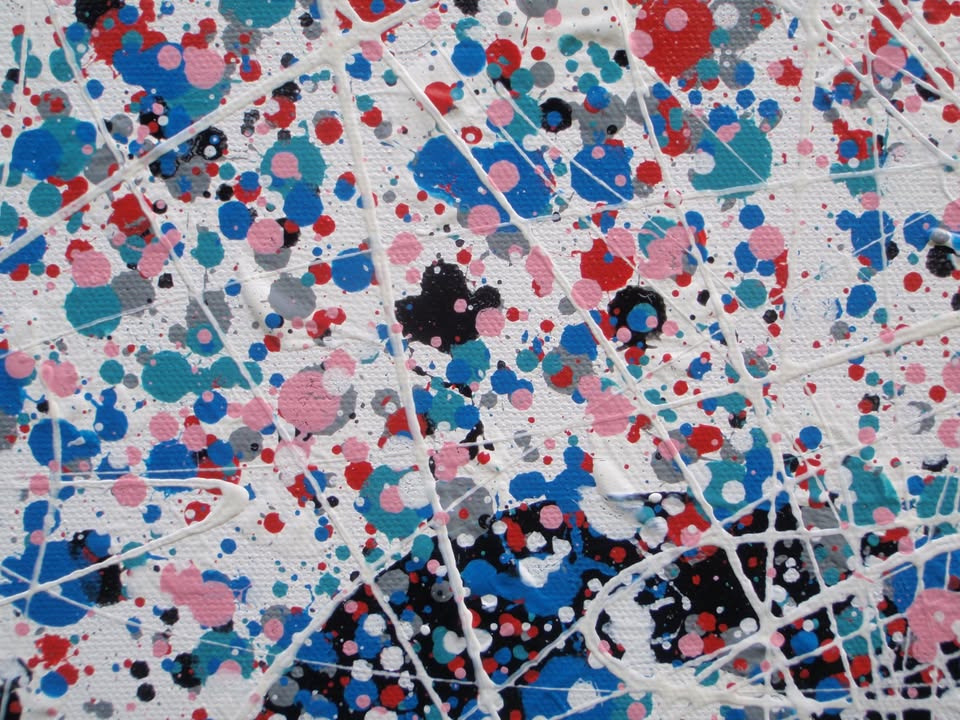 Colourful mosaic artwork with 'LOVE' spelled out on a textured background - detail