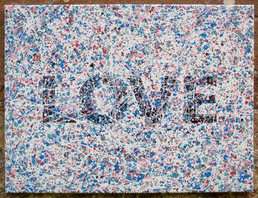 Colourful mosaic artwork with 'LOVE' spelled out on a textured background