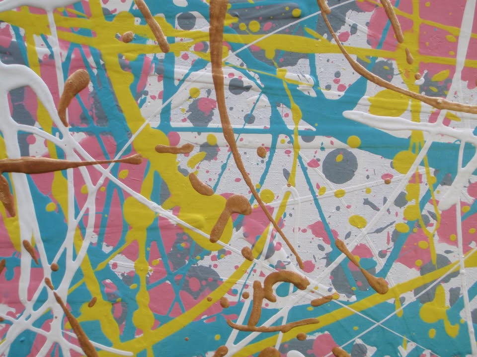 Abstract multi-colour paint splatter and drip artwork with dense white, pink, yellow, blue, and metallic gold across the full 143 by 100 cm framed canvas - detail