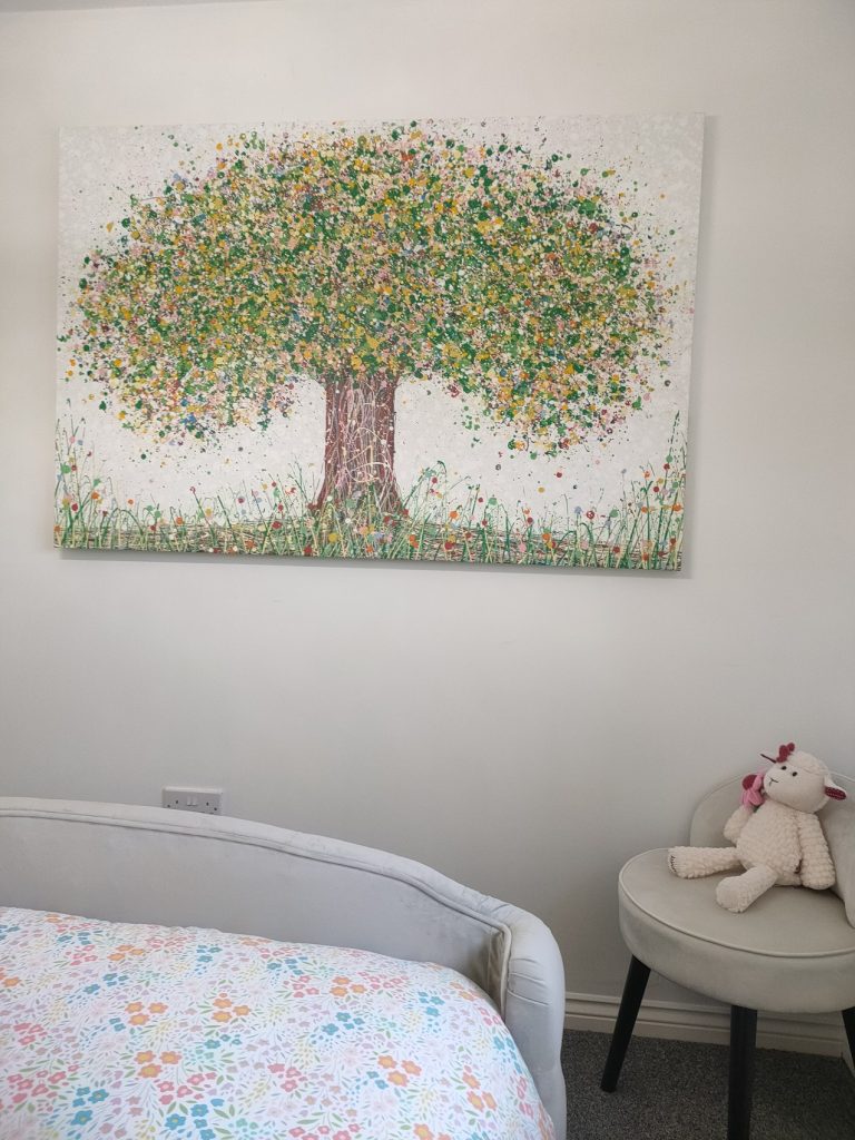 Customer showcase photo of my really big abstract green and yellow tree painting on an approximate 160 cm wide canvas